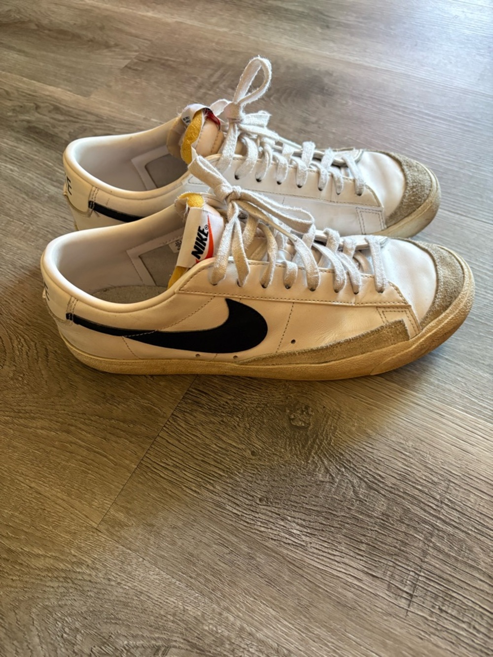 Nike Men’s White Sneakers with Black Swoosh and Tan Accents